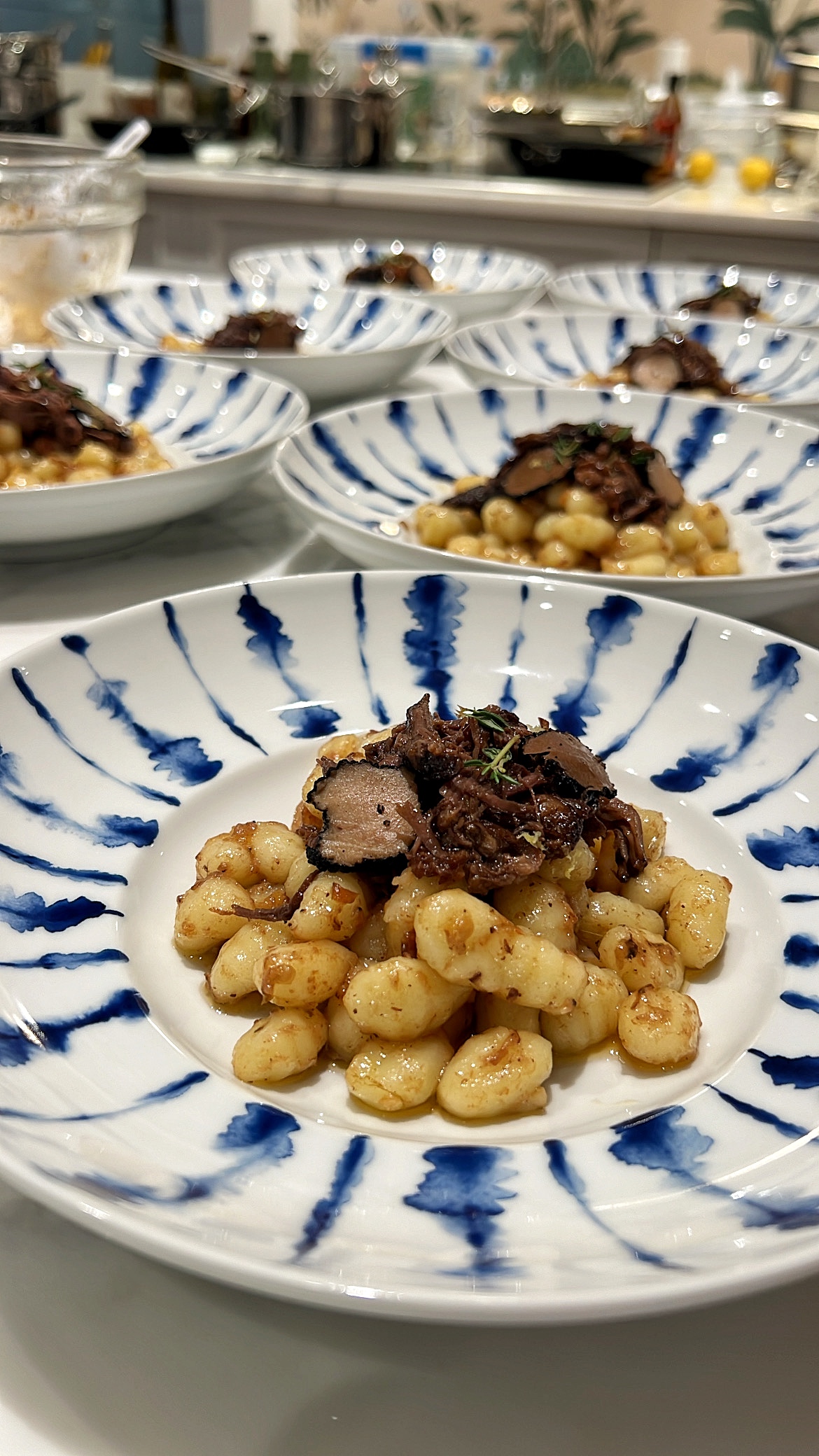 Freshly prepared dishes lined up for a catered gathering